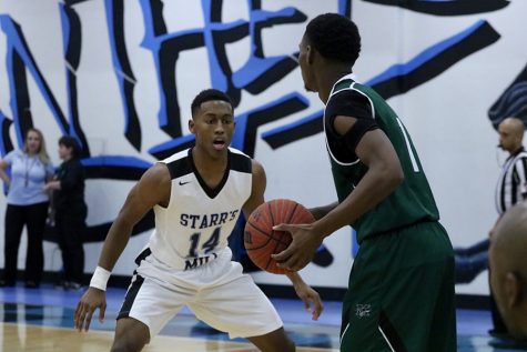 Senior Panther Julian Lynch defends senior Chief Bruce Carpenter. Carpenter, who scored 22 points, dueled with the talented Panther duo of senior Nate Allison and junior Jamaine Mann who combined for 38 points and 19 rebounds. Carpenter’s spectacular performance wasn’t enough, however, as Starr’s Mill claimed a 69-49 Battle of the Bubble victory.