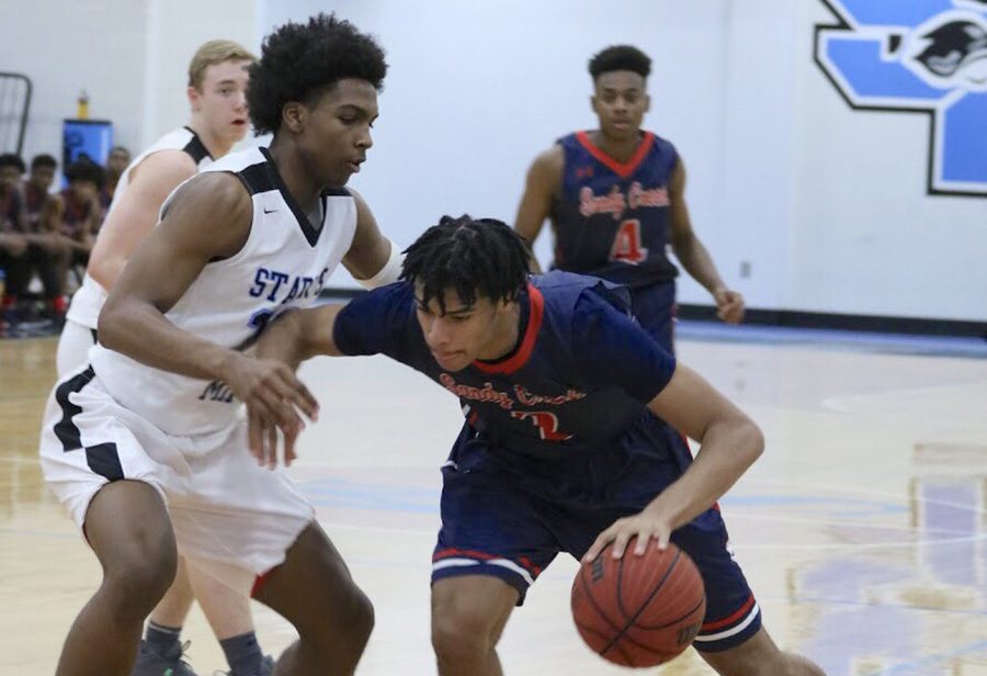 Junior Panther Jamaine Mann defends senior Patriot T.J. Bickerstaff. Mann, ranked 97th in the nation in the class of 2020 according to 247sports.com, scored 25 points while going head-to-head with Bickerstaff, who is a Drexel commit and nephew of NBA head coach J.B. Bickerstaff.
