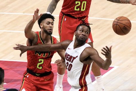Atlanta Hawks guard Tyler Dorsey defends Miami Heat guard Justise Winslow. Dorsey was scoreless against Miami, but he put up two assists and a steal. Winslow totaled 13 points, five rebounds, and three assists in the 106-82 loss to Atlanta. 