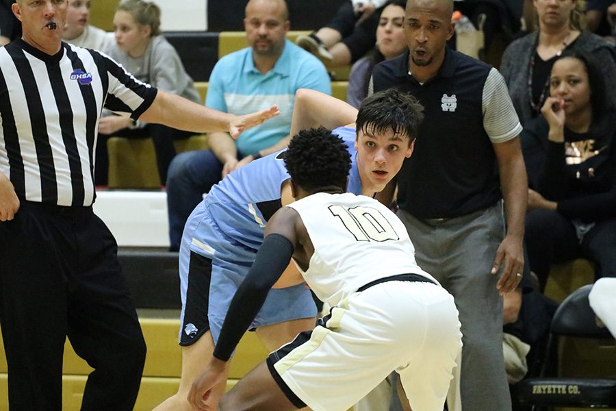Junior Panther Reese Clevinger sizes up a Fayette County defender. After going 4-1 over the holiday break, Starr’s Mill returned to region action against the Tigers. Fayette County, one of the top teams in the state, pulled away late for a 57-46 win over the Mill.