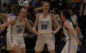 The Lady Panthers celebrate a game-tying buzzer beater by junior Ashtyn Lally. After a broken play, Lally hoisted a shot that banked in to send the game into overtime. Starr’s Mill would go on to win 61-55 in double overtime.
