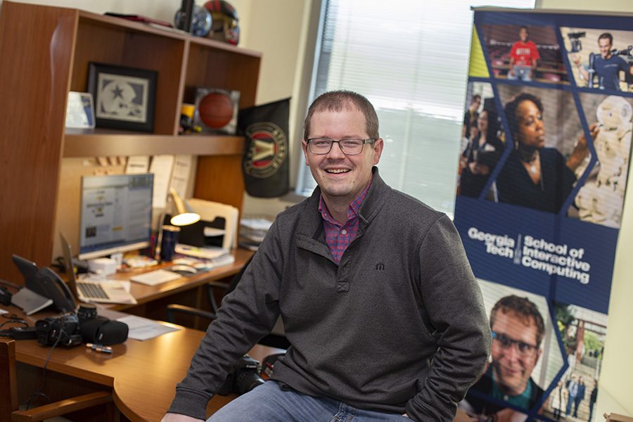 Former Panther David Mitchell sits in his office at Georgia Tech’s School of Interactive Computing. After graduating from the Mill in 2006, Mitchell went from writing to sports for local newspapers to working in public relations and promotions at Tech.
