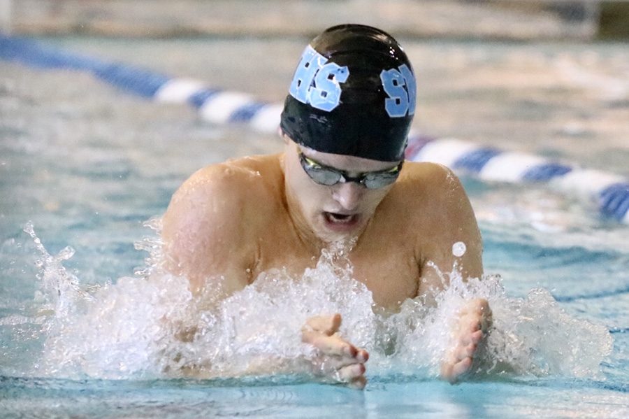Phifer races in the the 100-yard breaststroke. He placed second in the state in his division with a time of 57.18 seconds.  