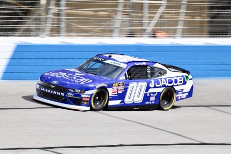 Cole Custer, driver of the No. 00 Jacob Companies Ford for Stewart-Hass Racing, wheels his car around 1.54-mile Atlanta Motor Speedway during one of Friday’s practices. Custer paced the first session at a speed of 178.218 mph and fell to third during the second practice. Custer will lead the race to the green flag this afternoon at 2 p.m.