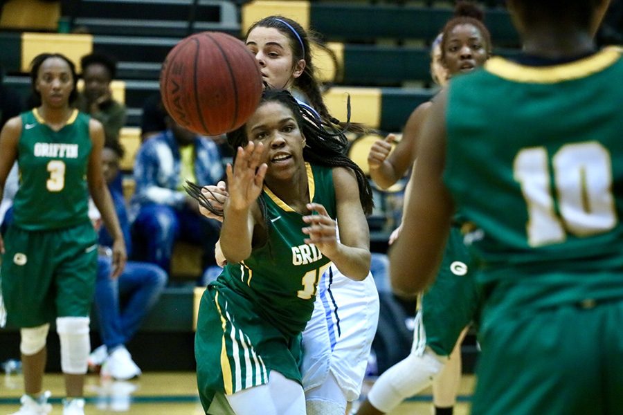 Griffin player passes to a teammate. Griffin defeated Starr’s Mill 50-43 in the Region 3-AAAAA tournament championship. The win avenged their last-second loss to the Lady Panthers in the semifinals of last year’s tournament. 