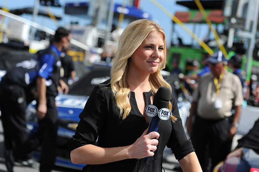 FOX Sports reporter Kaitlyn Vincie holds the microphone while reporting from pit road in 2015. Vincie embodies the idea of starting local and early. She started by uploading YouTube videos that she made at home covering races at Langley Speedway in Hampton, Virginia. The NASCAR fandom allowed for her to gain attention, and she caught the eye of FOX Sports.