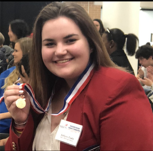 Junior Ashlynn Eisele received a medal for placing first at the SkillsUSA region five competition for medical assisting. SkillsUSA students will compete at the state competition from March 21-23.