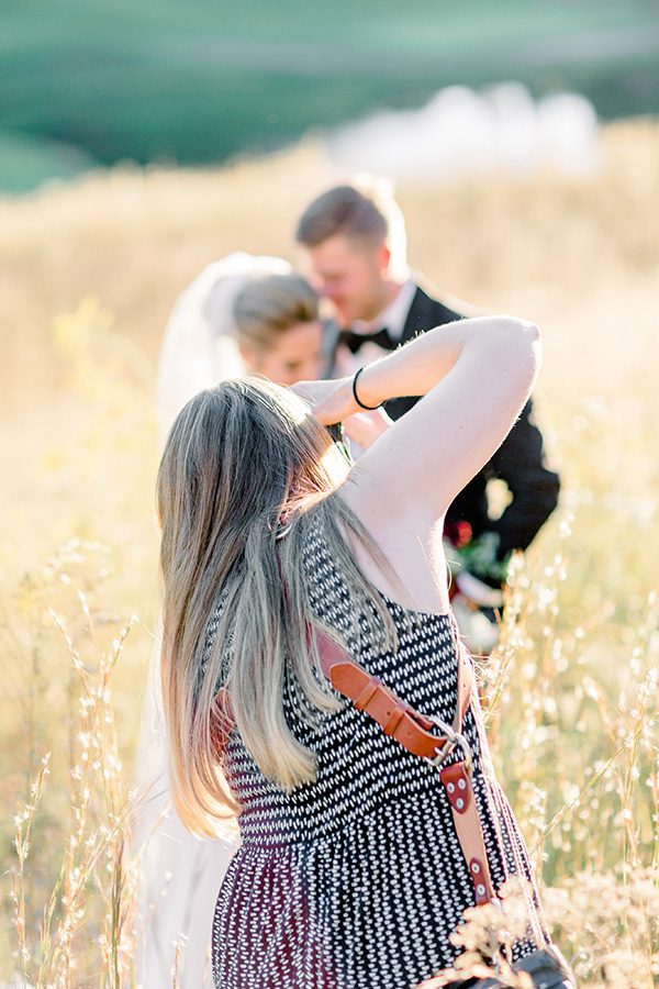 Starr’s Mill alumna Laura Watson photographs a couple on their wedding day. After initially pursuing a career in acting, Watson found she was better suited for photography and started her own wedding photography business in 2015.
