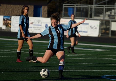 Senior Rachel Davison dribbles the ball en route to the goal. Davison was the only senior to play for the Lady Panthers during their senior night game. Typically, Davison plays as a defender, but she scored a goal in the game against Jonesboro.