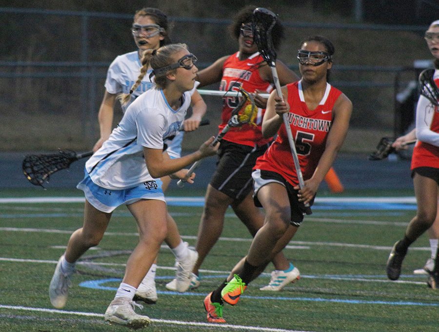 Freshman Emma Grace Hepler passes a Dutchtown defender en route to the net. Junior Ryanne King scored three goals against the Bulldogs, the most of the 12 different Lady Panthers that found the back of the net. Senior Alyssa Angelo and sophomore Jaci Edwards locked down the defensive end, helping hold Dutchtown to just one goal. 