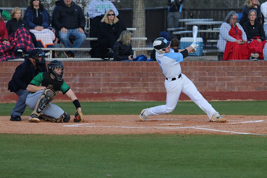 Senior Ryan Henderson takes a swing at the plate. Panther hitting, despite a slow start, was a key factor in the comeback 8-7 victory. Henderson and senior Brian Port had three hits each. 