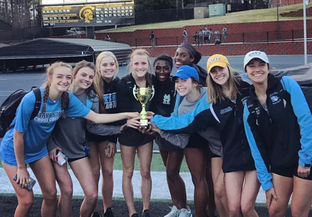 Members of the varsity girls’ track and field team pose with their trophy. At the Carrollton Invitational, the girls finished in 2nd place overall behind Central Phenix City. The boys’ team finished 10th overall at the event.