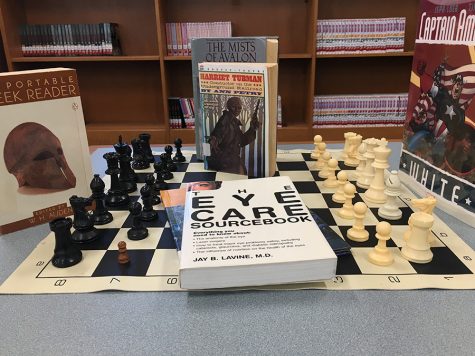 Plethora of book topics surrounding the Media Center chessboard represents the variety of interests that Starr’s Mill students have. If an interest is shared by many, they may influence the development of new electives offered.