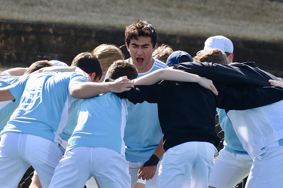 March 19, 2019 - Senior Sean Nima hypes up his team before their match against McIntosh. The boys’ tennis team fell to the Chiefs 4-1 while the Lady Panthers defeated McIntosh 3-2. 