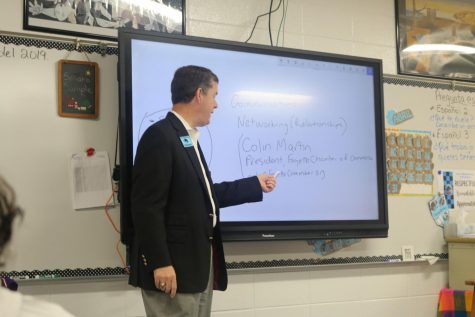 Guest speaker Colin Martin presents the importance of communication and networking with their implications in the free enterprise system. Martin even offered his own information for students to begin their network. 