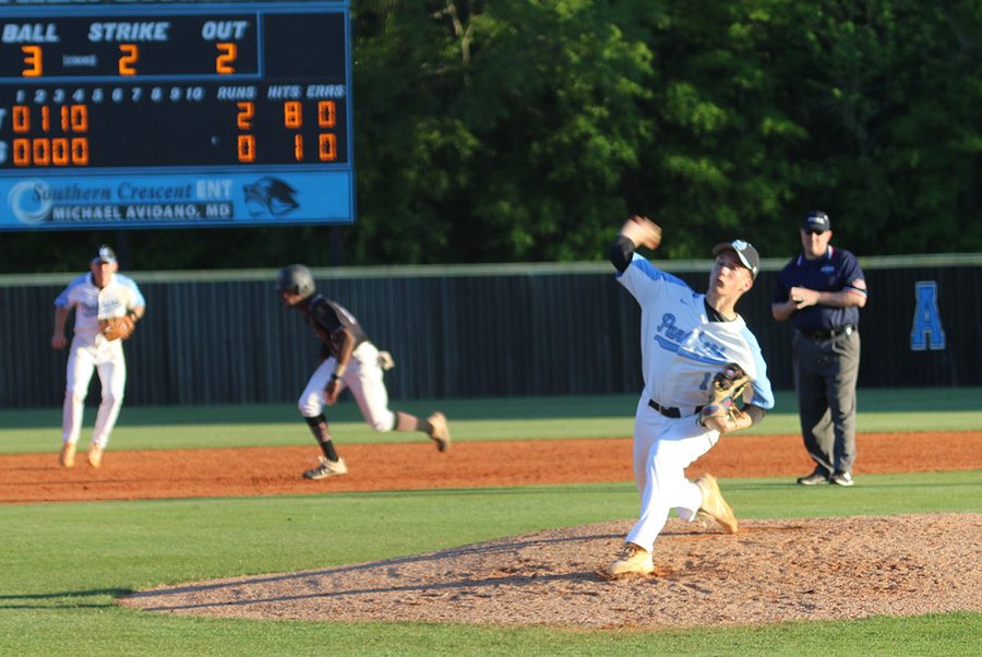 Junior Beau Gardner pitches against the Wildcats. Gardner struggled on the mound, allowing seven of Whitewater’s 13 hits in the game. He also allowed five of the visiting team’s nine runs.