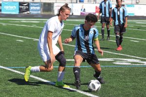 Senior Ryan Shanahan fights for possession against a Ware County defender. The Panthers were able to keep control of the ball for most of the game. This allowed Starr’s Mill to score goals at-will en route to an easy 8-0 victory.