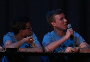 Seniors Jordan Botte (left) and Rhett Perry (right) answer questions during the History Bowl Smackdown. The students defeated their teachers after being behind at halftime. The social studies department hosted the event to help pay for the History Bowl team’s trip to nationals.