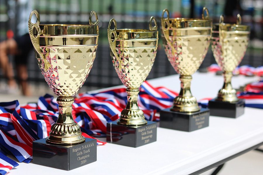 April 24, 2019 - Trophies and medals lay on a table during the Region 3-AAAAA track meet. 