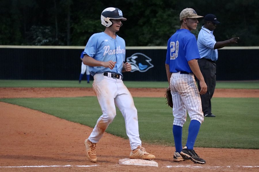 Senior Brian Port tags third base. In the second game of the series, Starr’s Mill consistently got into scoring position. The Panthers’ strong hitting performance allowed them to score six runs each in the fourth and fifth innings.