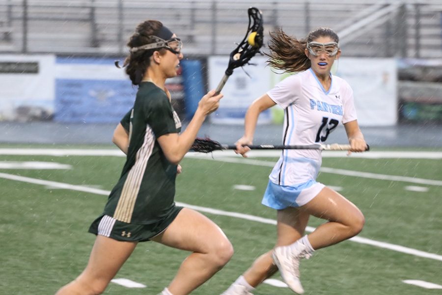 Freshman Briley Kalen defends a Wesleyan player. Fellow Freshman Emma Grace Hepler led the offense for Starr’s Mill, scoring multiple goals in the Lady Panther 21-point showing. Their high-powered offense will take on Fellowship Christian in the Final Four.