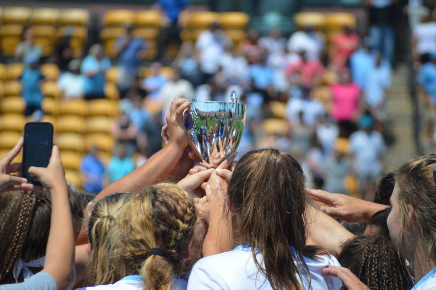 Lady Panther lacrosse team raises the championship trophy. Starr’s Mill defeated Blessed Trinity 11-8 to win the GHSA A-AAAAA State Championship, becoming the first team south of I-20 to do so.