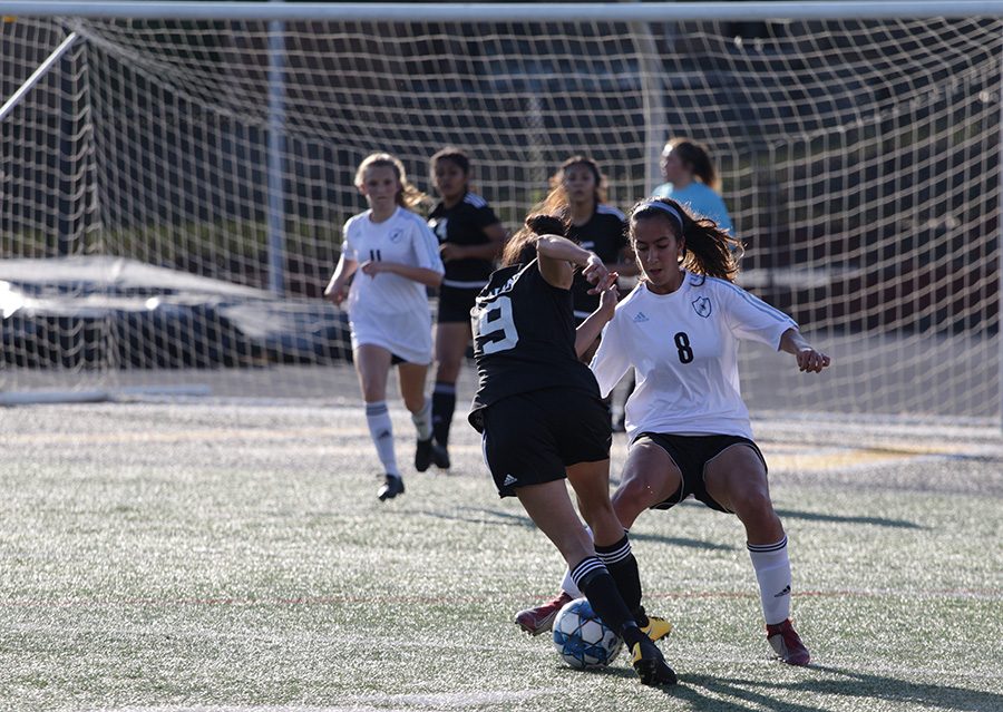 Sophomore Sofia Varmeziar blocks a Carrollton player from running at the goal. The Trojans dominated the Elite Eight game against Starr’s Mill, with the Lady Panthers not being their usual fighting force. The Mill had very little aggression or intensity, and it cost them their shot at advancing towards the state championship.