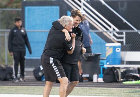 Coach Mike Hanie (left) hugs next year’s boys’ varsity soccer head coach Aaron Buck (right) at the Final Four game of the playoffs. The Panthers defeated Johnson 1-0 in overtime in the Final Four game, sending them to a rematch of the 2010 GHSA State Championship game against McIntosh where Hanie earned his second ring with Starrs Mill. Following this Saturday’s match, Hanie will retire after 22 years of working at Starr’s Mill. 