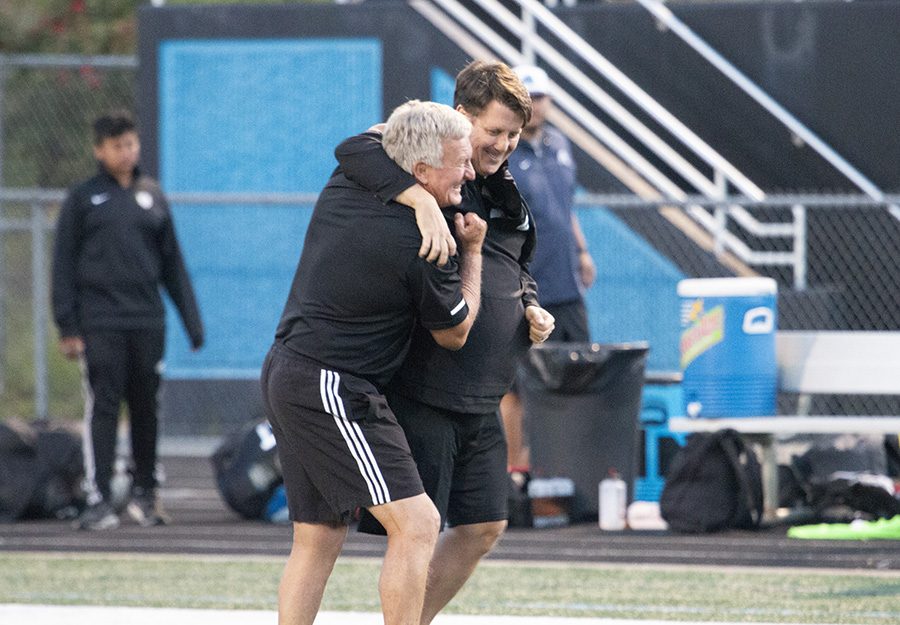 Coach Mike Hanie (left) hugs next year’s boys’ varsity soccer head coach Aaron Buck (right) at the Final Four game of the playoffs. The Panthers defeated Johnson 1-0 in overtime in the Final Four game, sending them to a rematch of the 2010 GHSA State Championship game against McIntosh where Hanie earned his second ring with Starr's Mill. Following this Saturday’s match, Hanie will retire after 22 years of working at Starr’s Mill. 