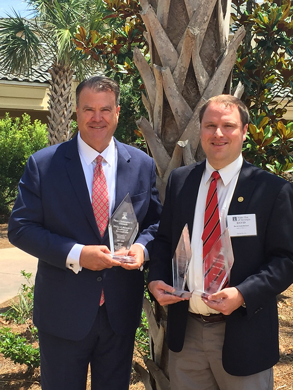 Starr’s Mill grad, David Ballard (right), poses with Judge Christopher C. Edwards (left), the Chief Judge of Fayette County of Superior Court. Since graduating from the Mill in 2003, Ballard has become a lawyer and heads his family’s law firm, Ballard Law Office, in Fayetteville, Georgia.