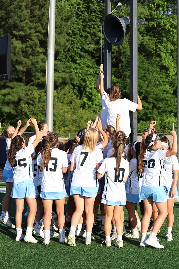 Lady Panthers team ring the victory bell after their 19-2 win over Fellowship Christian. Junior Ryanne King led the team with seven goals. The Mill is stacked with offensive firepower, and they look to utilize it in a championship rematch against Blessed Trinity.