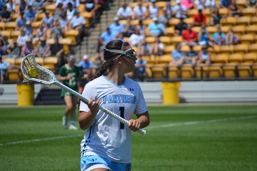 Angelo observes the field during the GHSA A-AAAAA State Championship game. Angelo scores twice in the contest, helping lead the Lady Panthers to an 11-8 win. She will attend Winthrop University in the fall to play lacrosse.