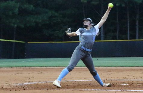 Sophomore Lilli Backes pitches against McIntosh. Backes threw a one-hit complete game shutout, including 15 strikeouts and four walks. She also performed well offensively, adding two RBIs on her 1-4 batting night.