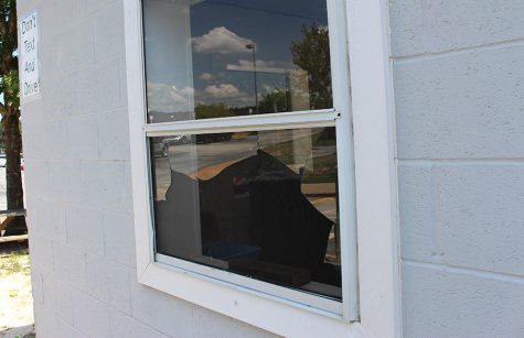 Parking lot attendant Fred Harrington’s damaged shed window. The vandalism took place sometime Monday night. The incident is currently under investigation as vandalism of school property. 