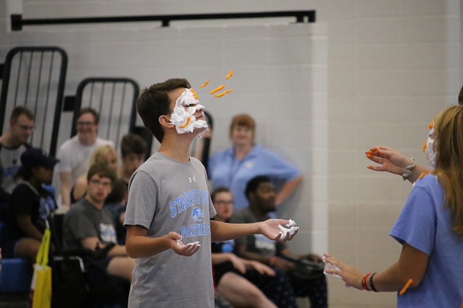 Sept. 10, 2019 - Sophomore Peter Beardsley participates in the pep rally. The objective of the game was to throw Cheetos onto their partners face, whoever had the most Cheetos on their face won.