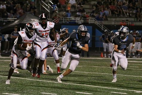 Sophomore Barrett Schmidlkofer looks to tackle an opposing player. Defense has been a strong suit, but two high scoring offenses in Jonesboro and Griffin will challenge this young defense right out of the gates.