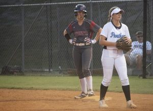 Junior Madilyn Cochran lined up on first base after a single hit. Cochran contributed two runs and a hit to the Wildcat offense.