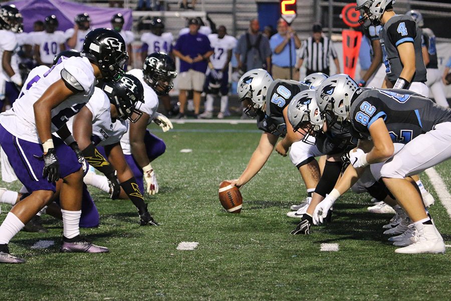 Senior Hunter Lawson gets under center, preparing for a new play. Lawson preached the pass game in the 28-21 loss, throwing for 147 yards and two touchdowns along with one interception. The question is, how will he fare against a Sandy Creek defense that has only given up 10 points in the team’s three wins?