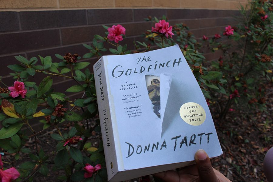 %E2%80%9CThe+Goldfinch%2C%E2%80%9D+by+Donna+Tartt%2C+is+a+riveting+literary+tale+about+a+boys+life+journey+after+his+mothers+death.+The+recent+film+release+disappointed+many+of+those+who+have+read+the+book+due+to+its+plot+holes+and+inconsistencies%2C+though+it+seemed+to+be+loved+by+those+who+did+not.+