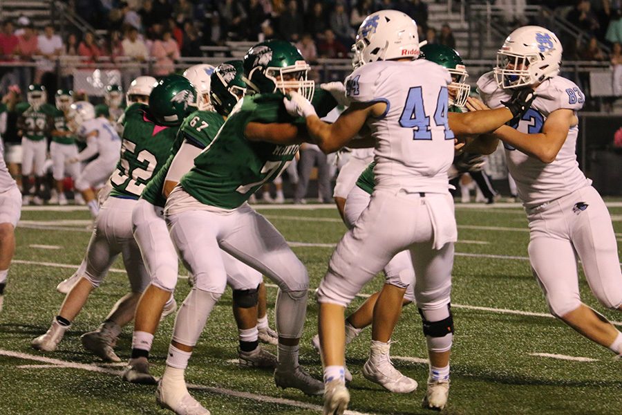 Sophomore Barrett Schmidlkofer looks to break free and tackle an opposing Chief. The Panther defense held the Chiefs to just 89 total yards while also sacking sophomore quarterback Hayes Herzog five times.