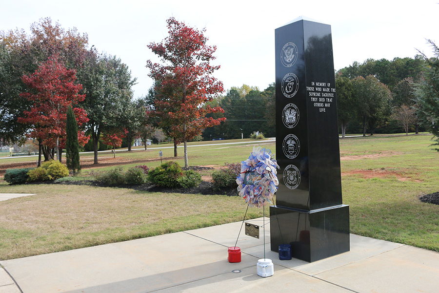Nov. 11, 2019 - Memorial at Kiwanis Park displayed with a red, white, and blue wreath in honor of Veteran’s Day.