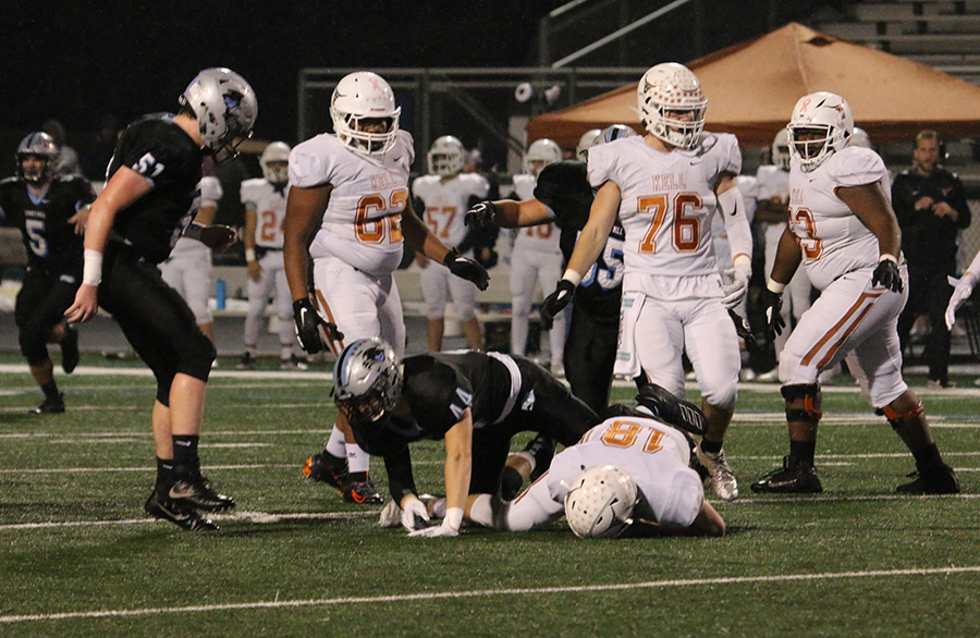 Sophomore Barrett Schmidlkofer tackles an opposing Longhorn. The Panther defense played one of their best games all season, only allowing 361 total yards in the 45-28 victory.