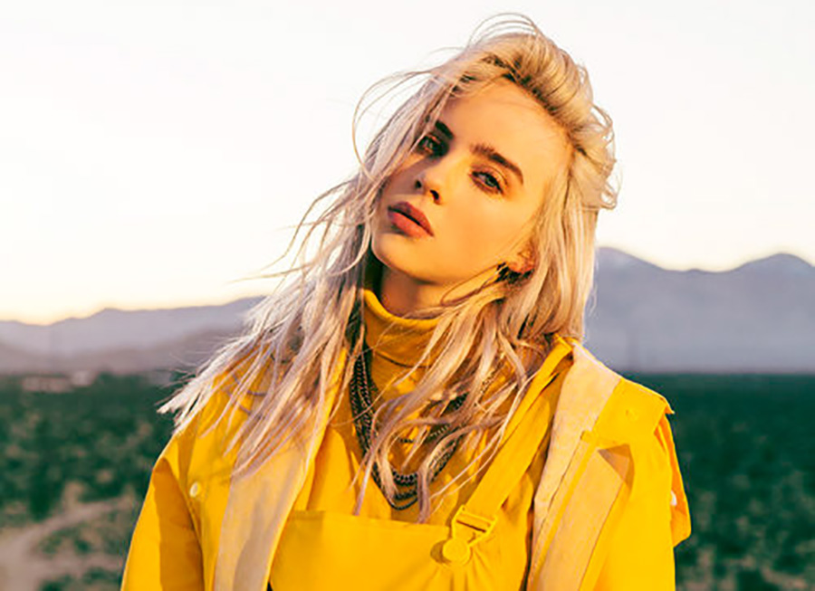 Billie+Eilish+on+set+of+her+music+video+for+her+song+%E2%80%9Cbellyache.%E2%80%9D+This+song+was+just+the+beginning+of+her+path+down+dark+and+twisty+lyrics+that+still+contribute+to+her+success.+