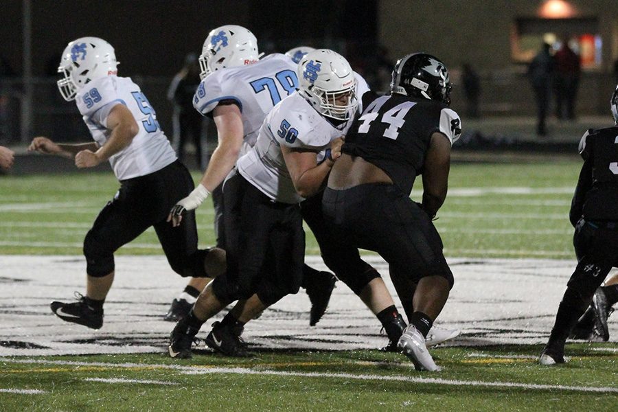 Senior Jeff Tiller blocks an opposing Raider. The Panther offensive line had another outstanding game, blocking well and allowing the backs to accumulate 289 rushing yards.