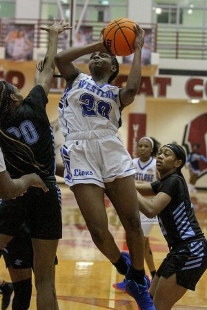 Westlake sophomore Ta’Niya Latson fights for a layup against Lovejoy in the Queens of the Hardwood main event. Westlake and Lovejoy, both top-20 teams in the nation, played a thrilling game of basketball that ended in a 55-52 victory for Westlake. Latson, who received player of the game honors, led Westlake with 23 points. “I think I did good. I definitely have to improve on my jumper” Latson said. “Other than that, I think I did pretty good.”