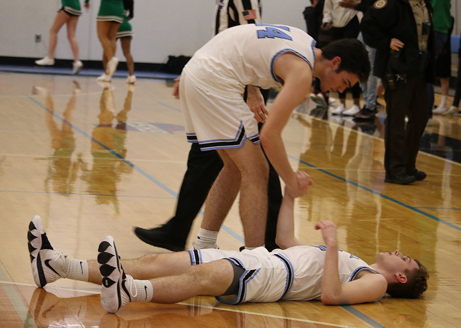 Junior Brandon Allison consoles senior Camden Sutherland after a last-second, game-tying shot that rimmed out. This is the second time this season that the result of the Battle of the Bubble was a three-point loss for the Panthers. After the win, the Chiefs sit fourth in the region, while the Panthers remain in last place.