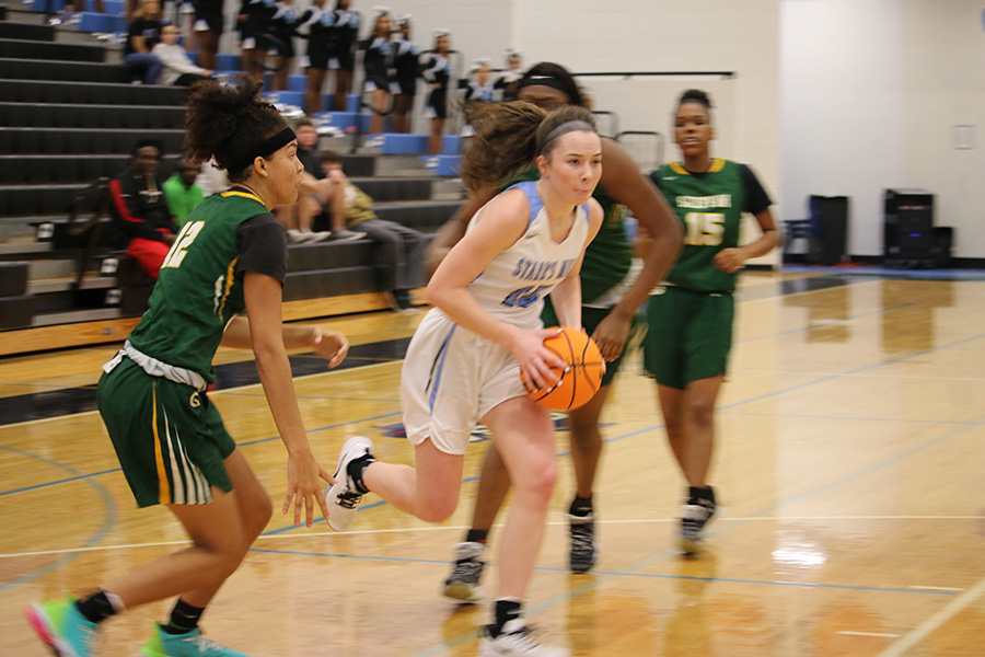 Senior Alice Anne Hudson drives down the lane for a layup. Hudson led the Lady Panthers in scoring with 17 points. She also kept the aggression on the defensive end, posting five blocks and three steals.