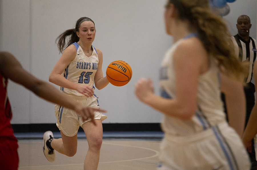 Senior Alice Anne Hudson takes the ball down the court against Jonesboro. On senior night Hudson scored 33 points, setting a new single-game scoring record for Starr’s Mill girls’ basketball. The previous record was 29 points.