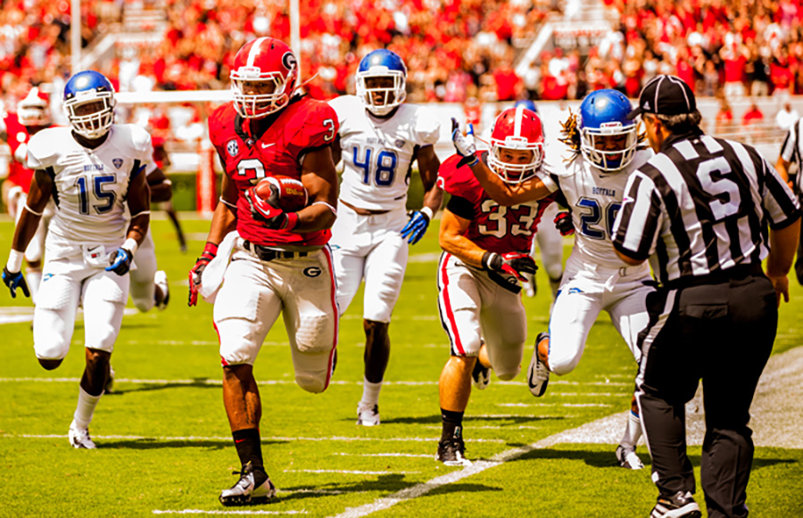 Todd Gurley (number 3) bringing Georgia to victory in July of 2015. He is a great example of college athletes playing their hardest based off how much they love the sport, without having feeling like they should get money for it. This is why college student-athletes shouldn’t get paid as amateurs. 