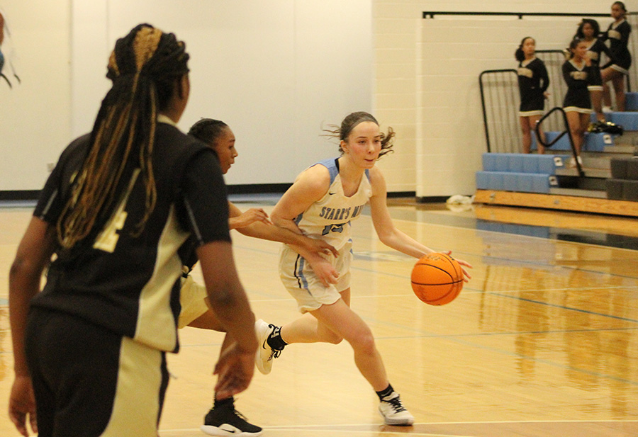 Senior Alice Anne Hudson moves around a defender. Hudson led the Lady Panthers with 14 points.